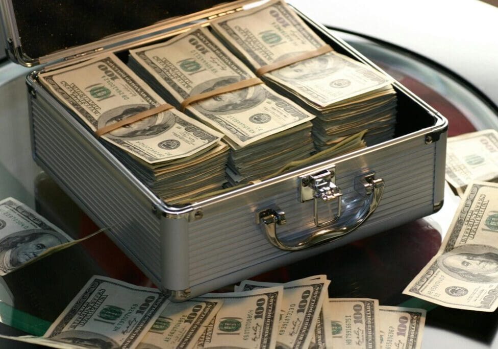 Picture of a briefcase filled with money